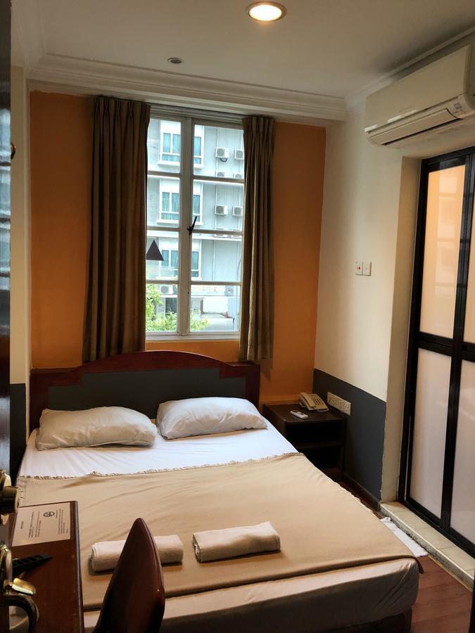 Happy Hotel Сингапур Стая снимка